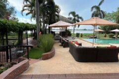 grounds of the island lodge in vietnam with seating area and pool