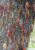 a close up of a tree in cambodia that has loads of coloured thread bracelets attached to it