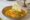 Viroth's Hotel plate of orange curry with a rice pile in the middle of the bowl
