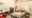 Dera Mandawa in india large bedroom with white walls, a desk and red sofa