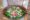 Sarai at Toria in india wooden bowl of salad with tomatoes, cucumber and white cheese