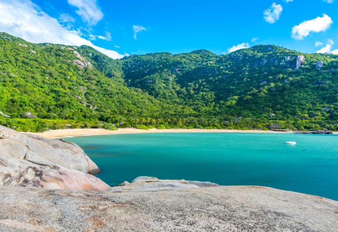 picture of a cove from the distnace on ninh van bay in vietnam with stretch of beach