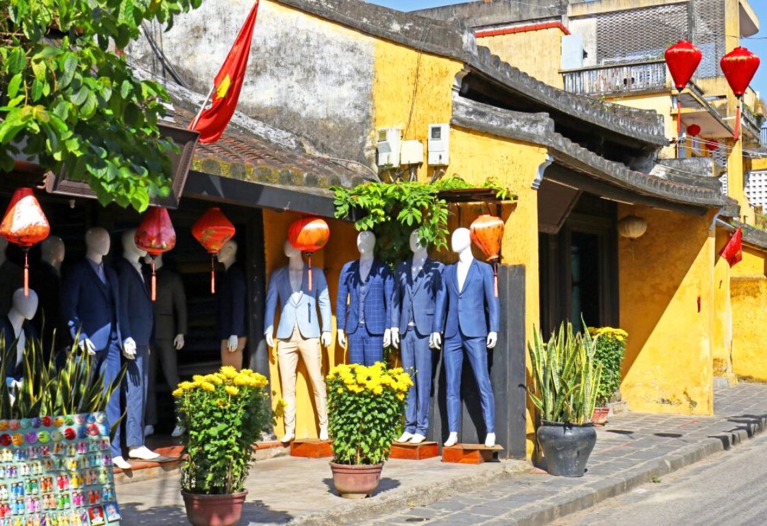 mannequins outside a tailor shop in hoi an, vietnam