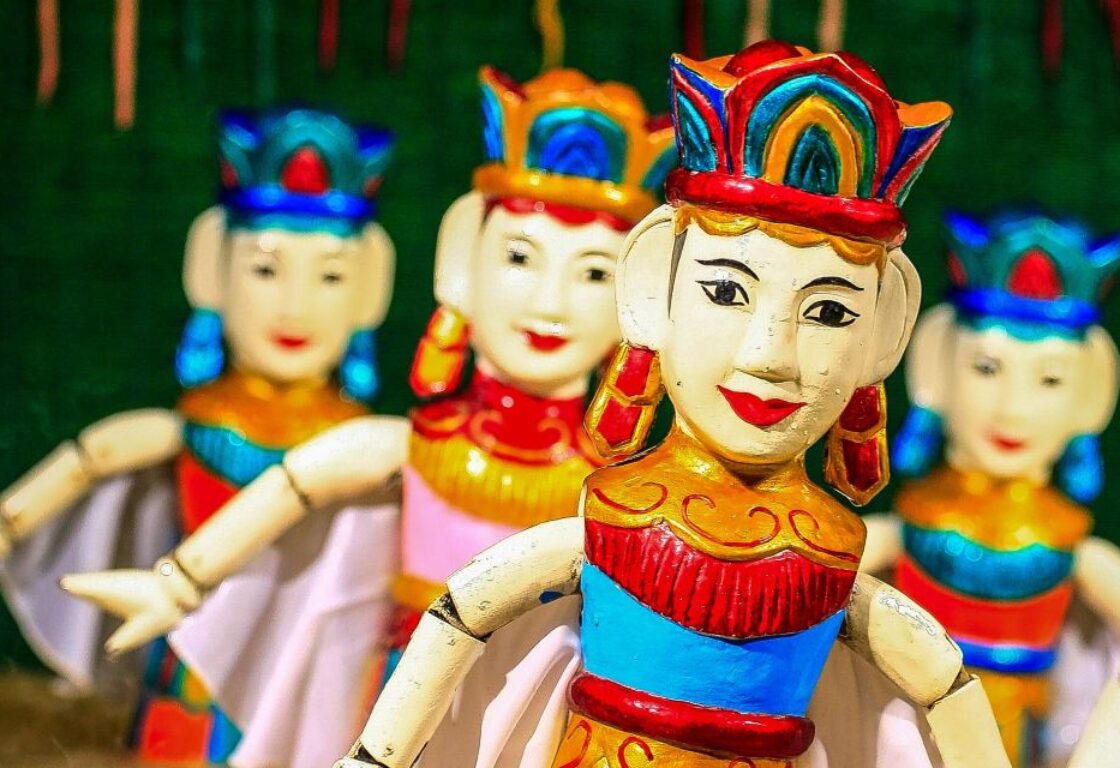 colourful and bright wooden puppets in hanoi