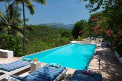 swimming pool overlooking countryside in Sri Lanka