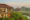 individual bungalows with two floors and top to ceiling windows overlooking rice paddies in sri lanka