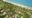 aerial view ov the property overlooking the beach and ocean Karpaha Sands