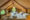 Thamaravilla bedroom featuring tent style property with double bed, private balcony, rugs and views over the countryside