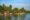 Views of a lagoon house and boats on the Negombo Lagoon in Sri Lanka