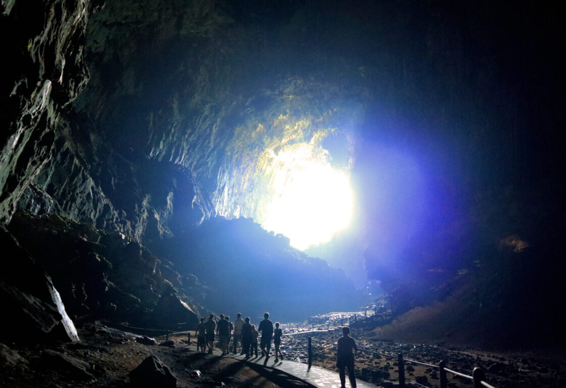 underground tour, people walking in Mulu Caves Borneo