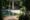 pool area tucked between trees with a pool hut at the Wallawwa