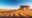 a red walled square lodge located lone in the kalahari desert, Bagatelle Lodge Kalahari
