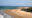 an aerial view of a beach and ocean in Kenya