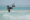 a man kitesurfing in the ocean