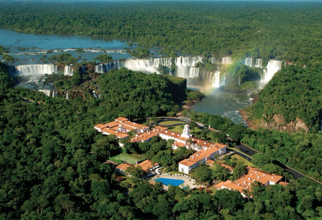 Aerial shot of Hotel Belmond des Cataratas in Iguacu National Park, with falls visible behind