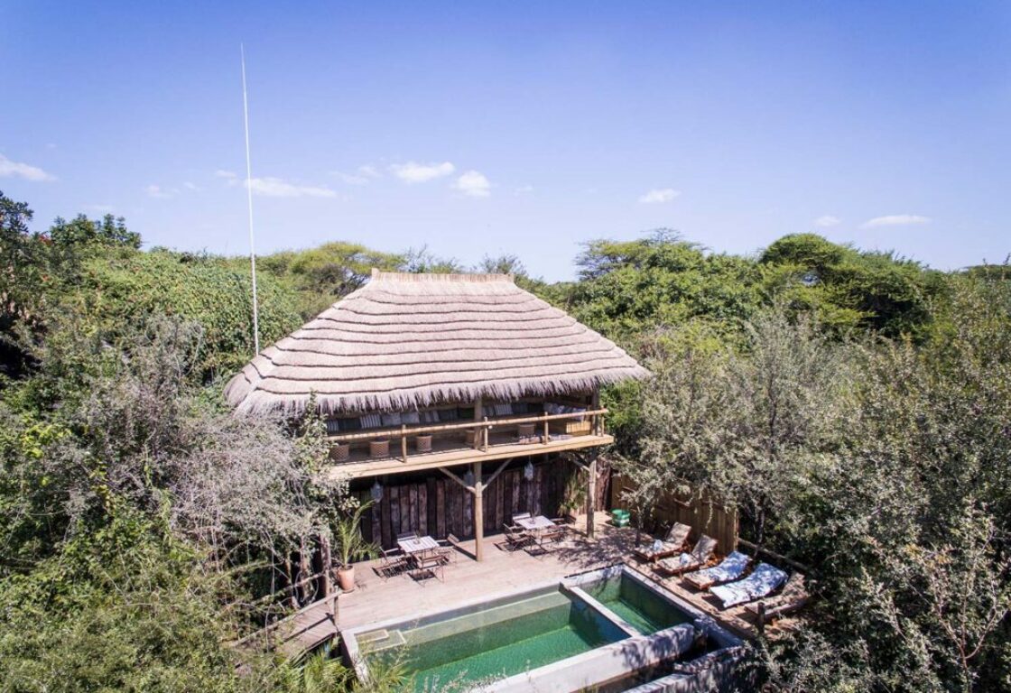 a view of Chobe-Bakwena-Luxury-Eco-Lodge- with a pool and surrounding trees all around