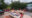 outdoor area featuring low sofas and futons, colourful cushions, patterned rugs - all between domes in Patagonia