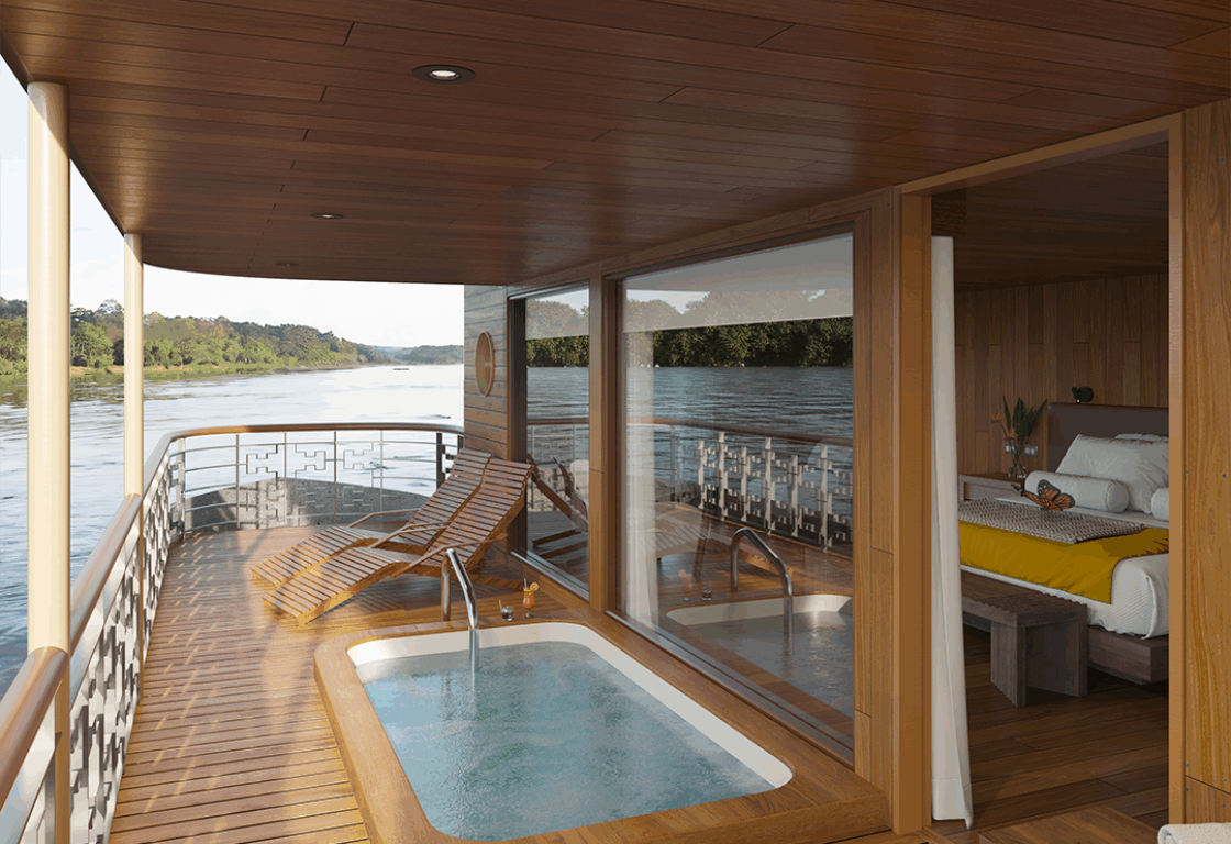 A plunge pool on a private deck with loungers, and the bedroom visible behind sliding glass doors on Delfin I, Amazon