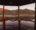 a lake view from a wooden terrace from the Mosaic Lagoon Lodge