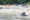white water rafting with wild river and blue rafts in the water