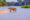 A jaguar wades into the Rio Cuiaba as tourists look on, Brazilian Pantanal