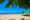 Painted boat on a sandy beach at Porto Seguro, Trancoso Brazil