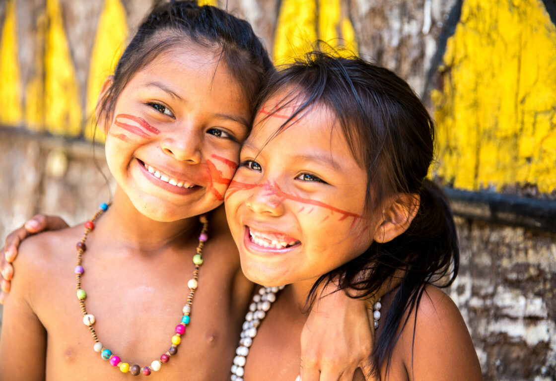 Smiling indigenous girls in the Brazilian Amazon