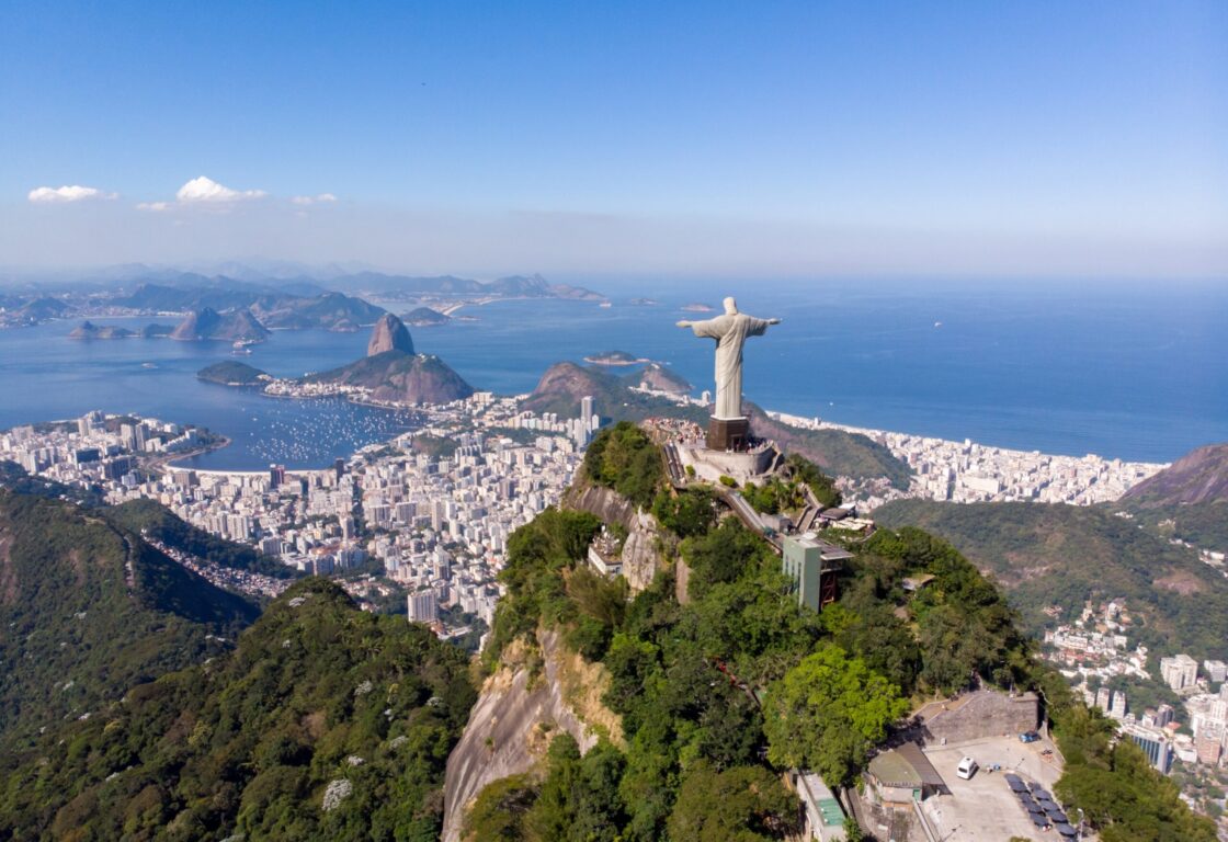 RIO DE JANEIRO, BRAZIL - MARCH 20, 2024 Aerial view of Christ Statue on Corcovado Hill overlooking skyline of Rio de Janeiro, Brazil. One of the world most popular landmark