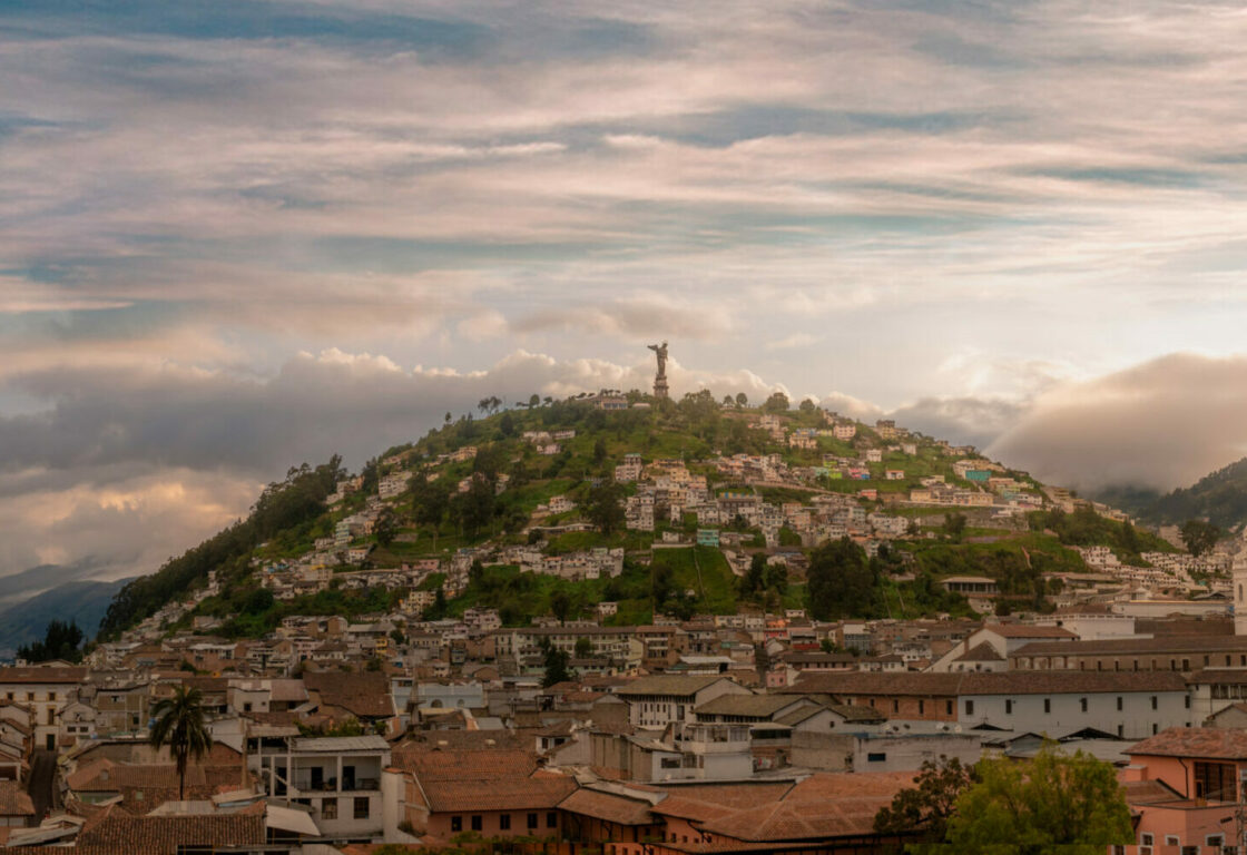 Wide shot of Quito's historic centre at sunset