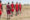 maasai mara warriors walking in a row