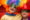 two boys in colourful masks having fun at Carnival in Brazil. Family holiday in Brazil