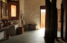 Bathrooms with al fresco showers at Flame of the Forest