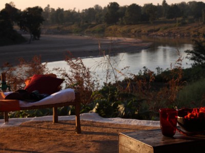 Day beds overlooking the Banjar River at Flame of the Forest