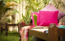 Enjoy a refreshing juice in the garden at Mango House